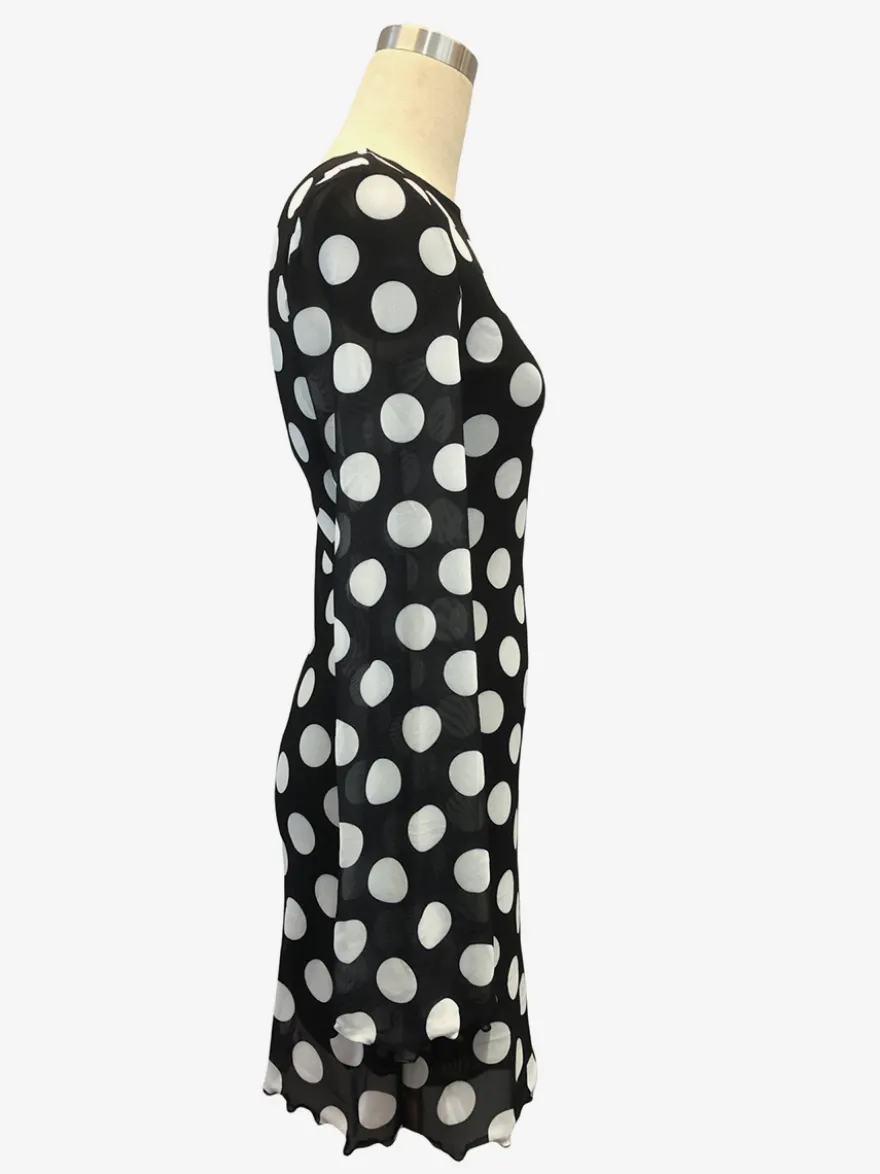 Robe mini moulante à pois manches longues et dos nu collection 2026