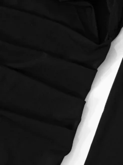 Robe moulante noire à découpes et manches longues épaules rembourrées pour femme 2026