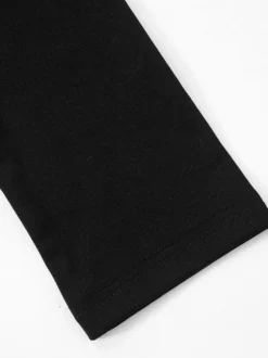 Robe moulante noire à découpes et manches longues épaules rembourrées pour femme 2026