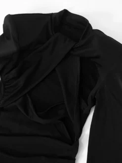 Robe moulante noire à découpes et manches longues épaules rembourrées pour femme 2026