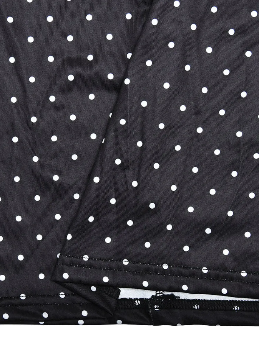 Robe noire cintrée et élégante à pois parfaite pour les sorties décontractées.