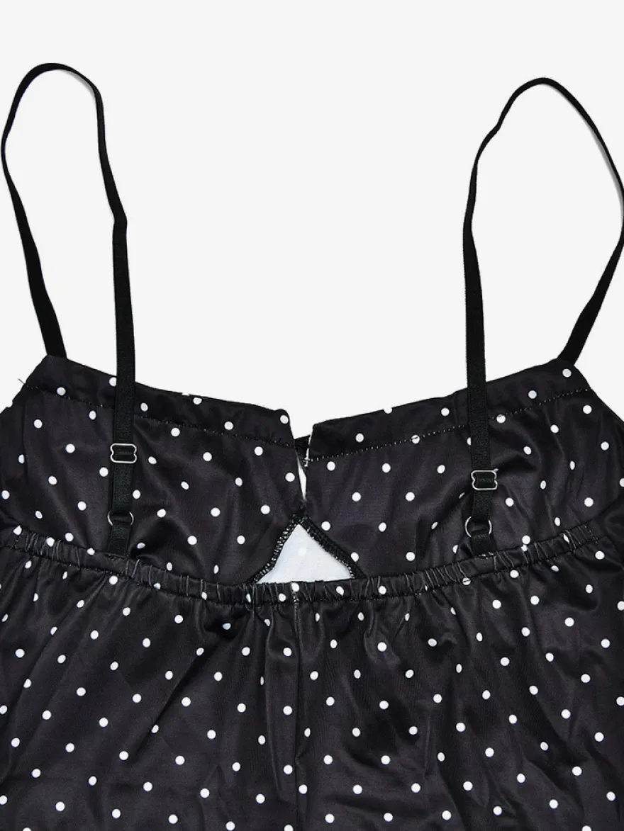 Robe noire cintrée et élégante à pois parfaite pour les sorties décontractées.