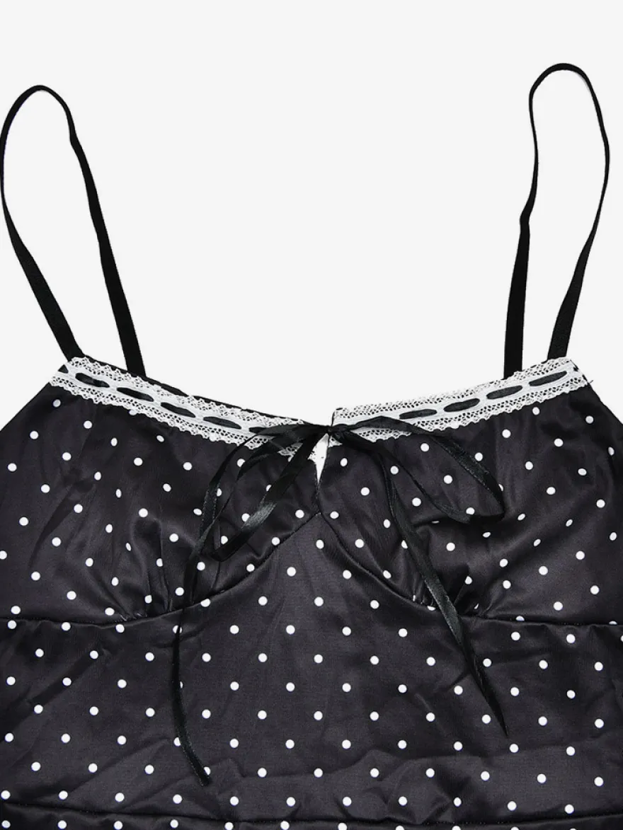 Robe noire cintrée et élégante à pois parfaite pour les sorties décontractées.