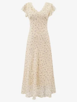 Robe noire de tous les jours en dentelle à manches courtes col montant et taille haute.