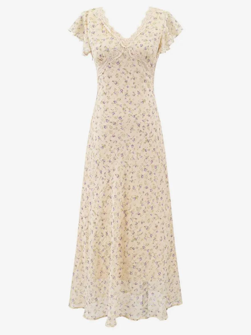Robe noire de tous les jours en dentelle à manches courtes col montant et taille haute.