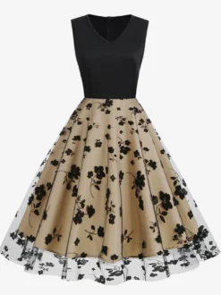 Robe rétro glamour années 50 noire bicolore à volants brodée sans manches col en V style rockabilly