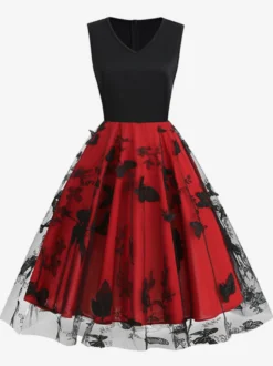 Robe rétro glamour années 50 noire bicolore à volants brodée sans manches col en V style rockabilly