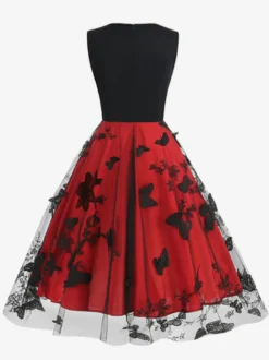 Robe rétro glamour années 50 noire bicolore à volants brodée sans manches col en V style rockabilly