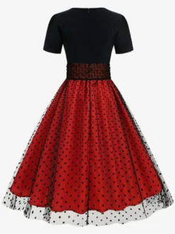 Robe rétro glamour style années 50 col rond manches courtes superposées taille moyenne à pois style rockabilly