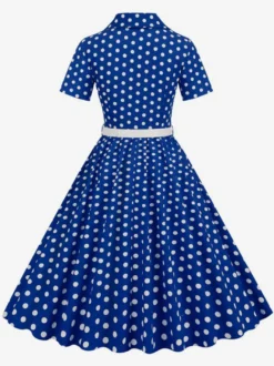 Robe rétro glamour style années 50 col rabattu boutons manches courtes robe trapèze à pois