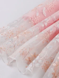 Robe rétro rose brodée coupe trapèze style années 50 robe midi évasée pour femme 2026