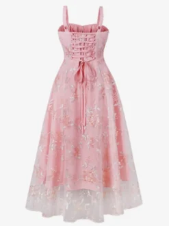 Robe rétro rose brodée coupe trapèze style années 50 robe midi évasée pour femme 2026