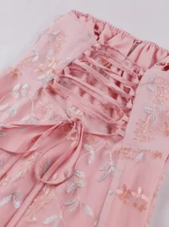 Robe rétro rose brodée coupe trapèze style années 50 robe midi évasée pour femme 2026