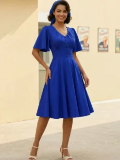 Robe rétro swing pour femme col en V froncée sur le devant boutons décoratifs manches papillon collection 2026