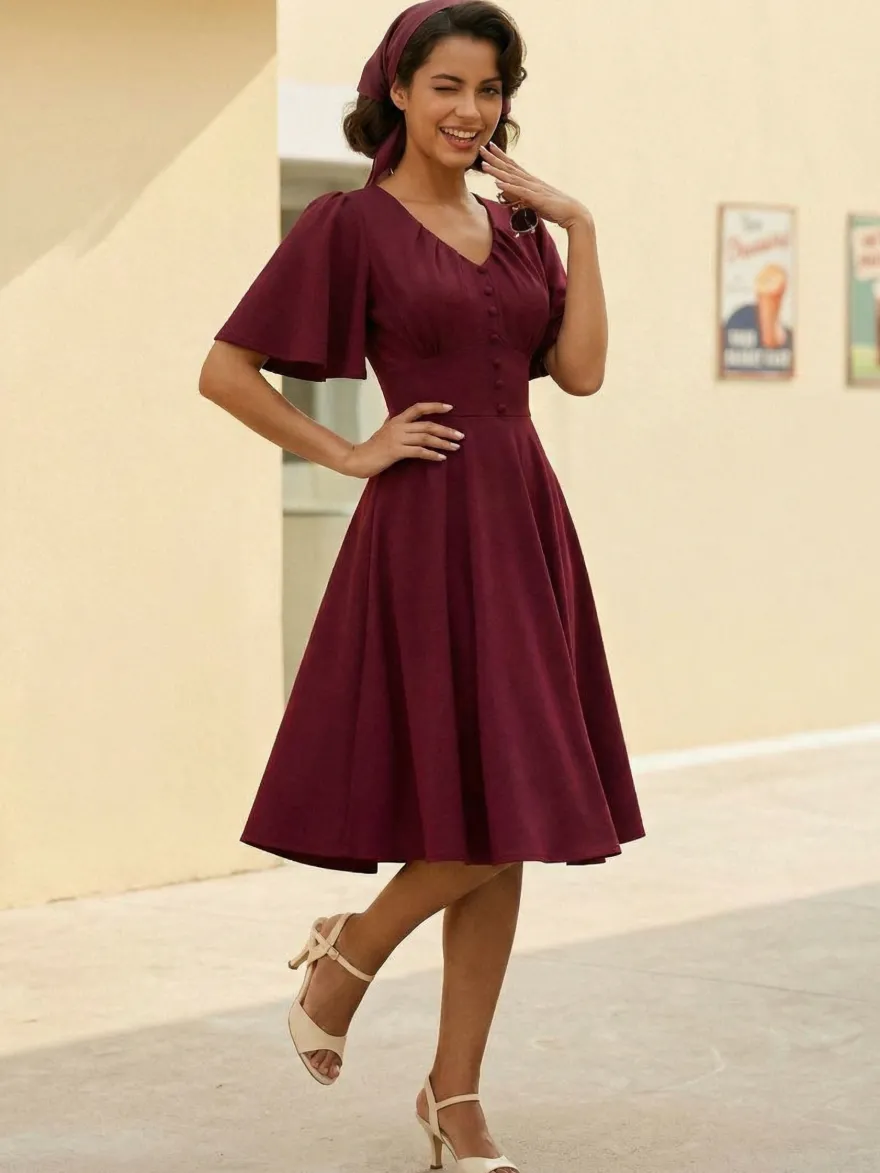 Robe rétro swing pour femme col en V froncée sur le devant boutons décoratifs manches papillon collection 2026