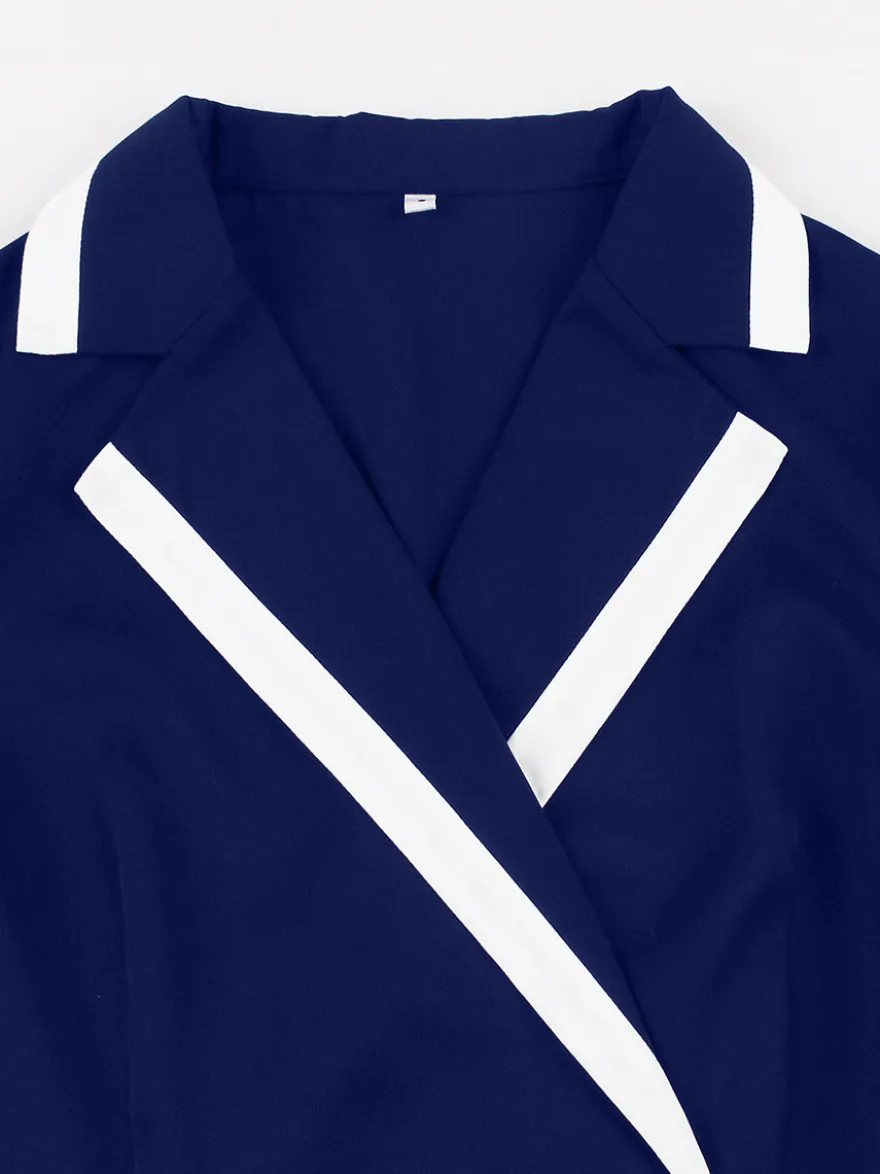 Robe rétro trapèze à col à revers contrasté et double poche pour femme (collection 2026)