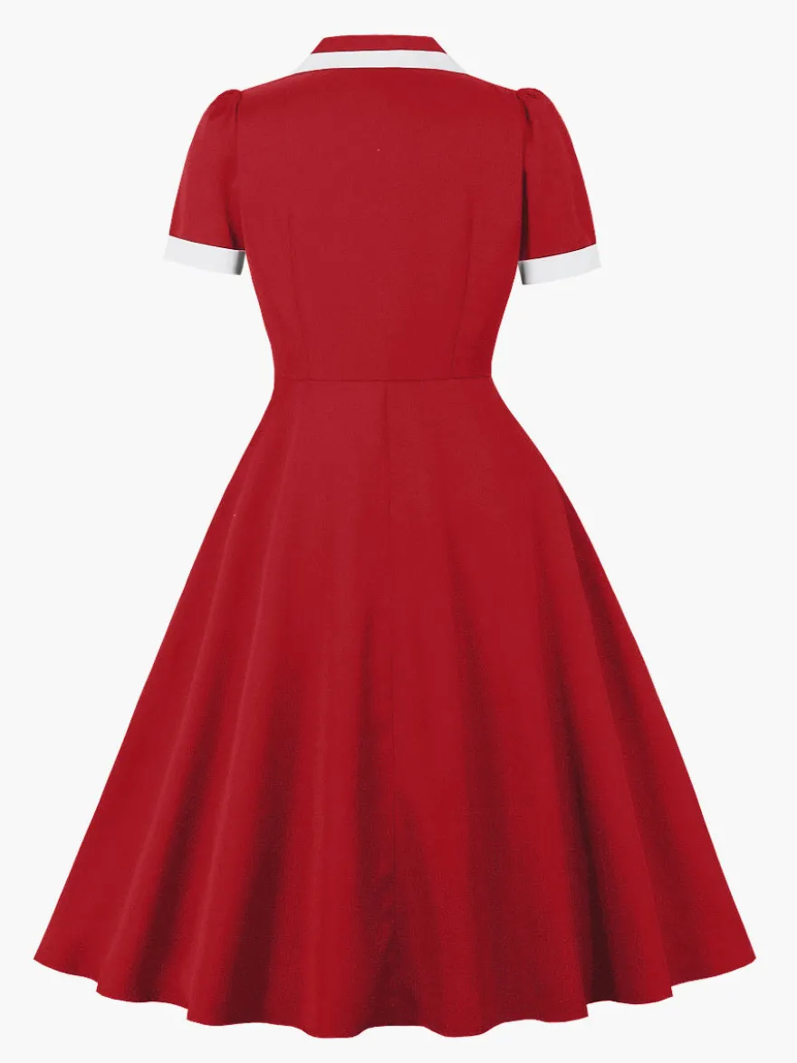 Robe rétro trapèze à col à revers contrasté et double poche pour femme (collection 2026)