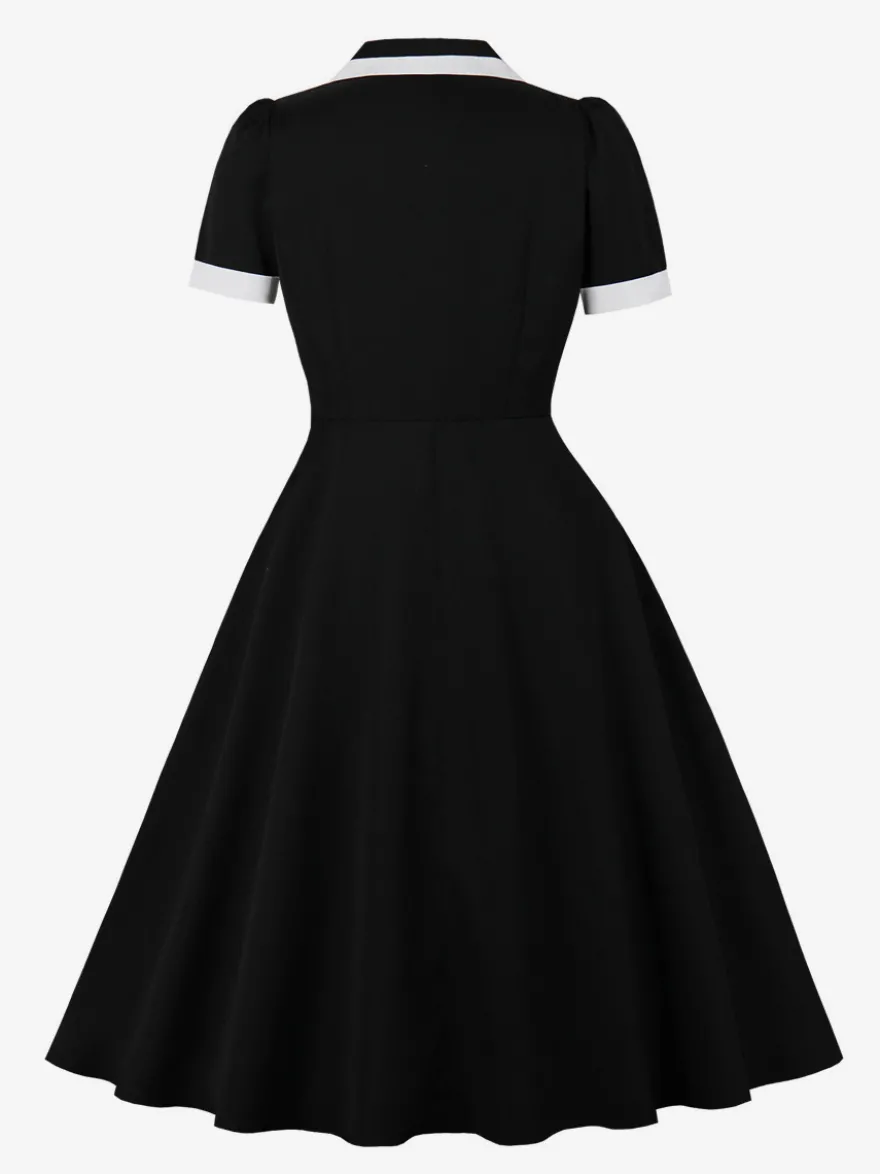 Robe rétro trapèze à col à revers contrasté et double poche pour femme (collection 2026)