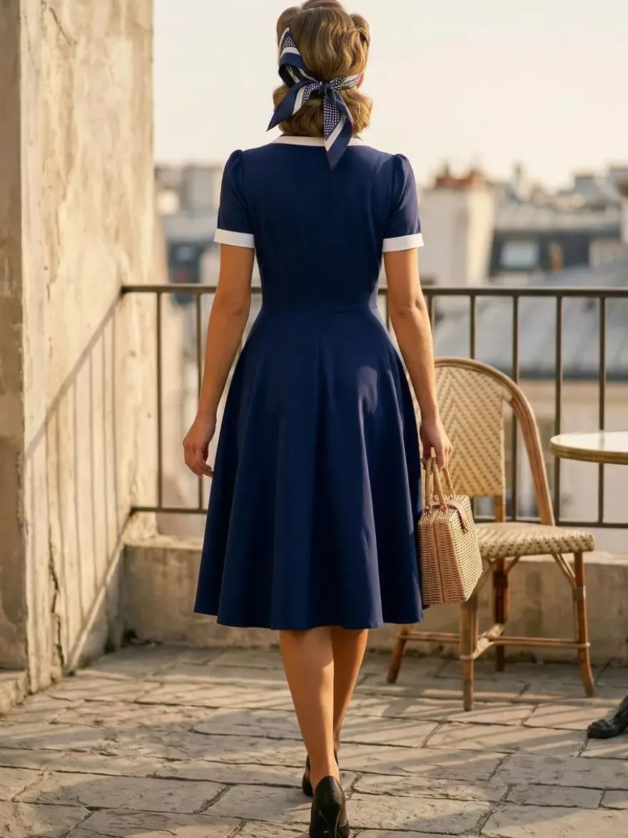 Robe rétro trapèze à col à revers contrasté et double poche pour femme (collection 2026)