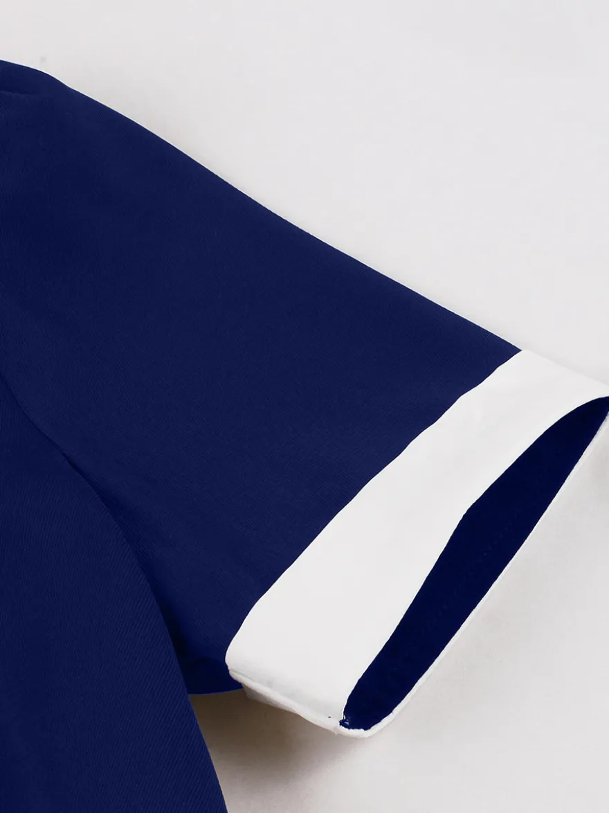 Robe rétro trapèze à col à revers contrasté et double poche pour femme (collection 2026)