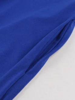 Robe swing vintage pour femme années 1950 ornée de détails contrastés col à nœud idéale pour un tea party.