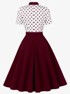 Robe trapèze rétro à pois patchwork col nœud papillon manches courtes collection 2026