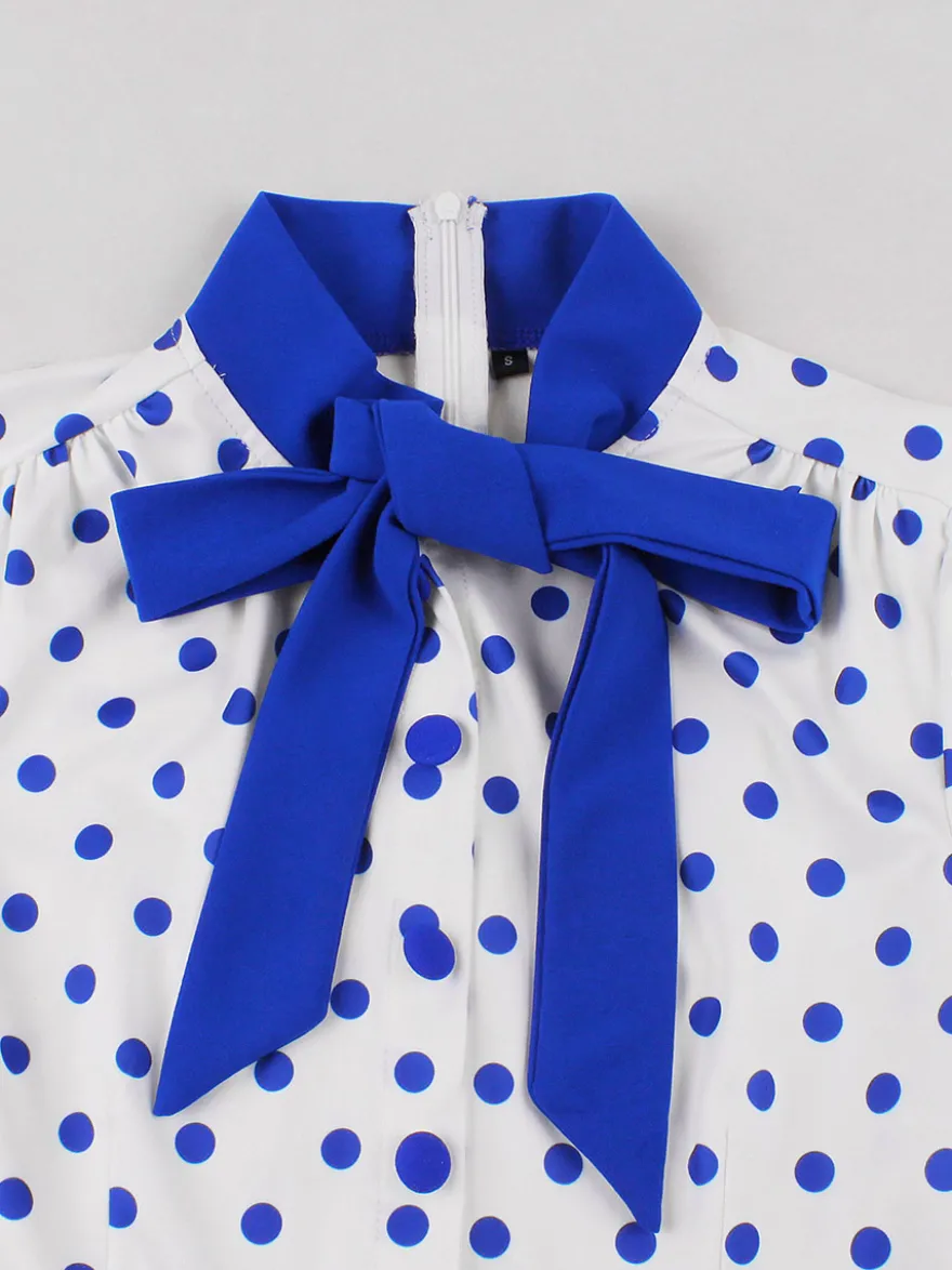 Robe trapèze rétro à pois patchwork col nœud papillon manches courtes collection 2026