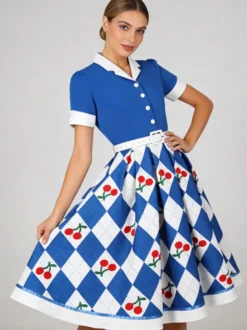 Robe trapèze vintage années 50 à imprimé fruits col contrastant manches bouffantes et ceinture