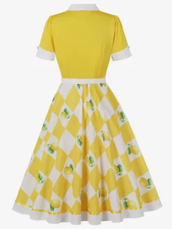 Robe trapèze vintage années 50 à imprimé fruits col contrastant manches bouffantes et ceinture