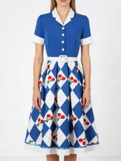 Robe trapèze vintage années 50 à imprimé fruits col contrastant manches bouffantes et ceinture