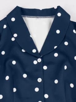 Robe vintage à pois revers manches courtes boutons sur le devant ceinture ajustable robe midi évasée style rétro