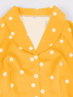 Robe vintage à pois revers manches courtes boutons sur le devant ceinture ajustable robe midi évasée style rétro