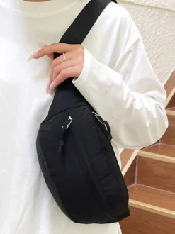 Sac banane léger en nylon color block bandoulière réglable idéal pour les voyages en extérieur.