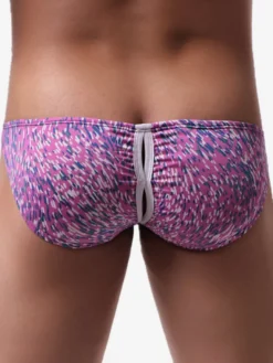 Sous-vêtements transparents sexy pour homme imprimé floral léopard string en maille taille basse entrejambe ouverte fermeture à boutons-pression.