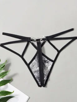 Sous-vêtement string pour homme imprimé serpent taille basse à bretelles.