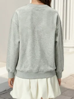 Sweat-shirt oversize à col rond et nœud en dentelle poche kangourou manches longues