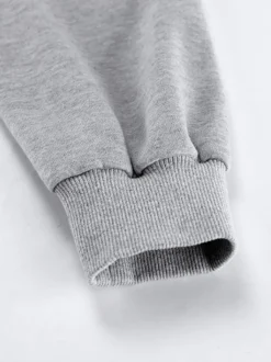Sweat-shirt polo oversize drapé boutons partiels sur le devant pull basique décontracté