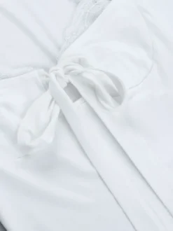 Top court à nœud papillon et bordure en dentelle pour femme - Chemisier Fairycore blanc à manches longues et coupe ajustée - Tenue de soirée printanière 2026