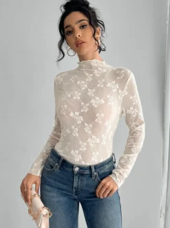 Top à manches longues en maille transparente avec nœud intégral jacquard pour femme 2026