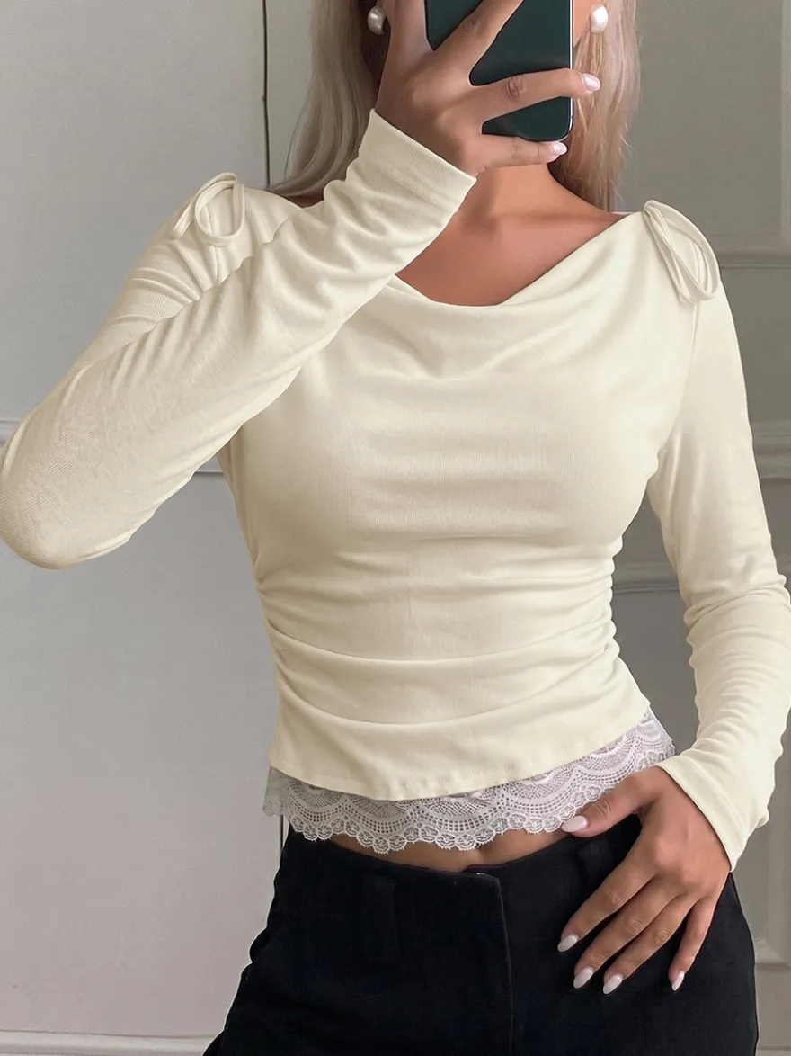 T-shirt femme à manches longues et col drapé détail bretelles à nouer ourlet en dentelle coupe slim décontractée