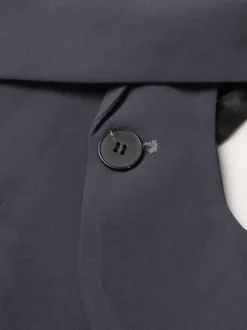 Veste de tailleur à bretelles croisées et découpes dos torsadé et ourlet asymétrique